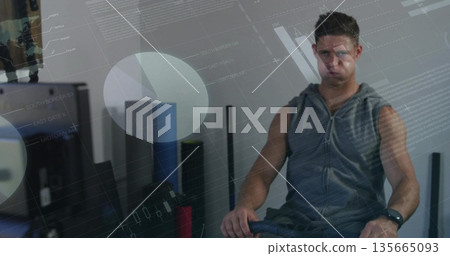 Sitting man wearing gray hoodie on bench in fitness studio, AR overlay, copy space Sitting man wearing gray hoodie on bench in fitness studio, AR overlay, copy space 135665093