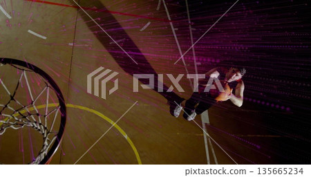 Athlete holding basketball at free throw line court, with hoop net and digital streaks, copy space Athlete holding basketball at free throw line court, with hoop net and digital streaks, copy space 135665234