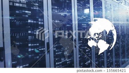 Showing server rack cabinets glowing with LED lights in data center room, with world map overlay 135665421