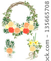 A set of natural wreath and mini bouquet of yellow and red ranunculus to welcome spring. 135665708