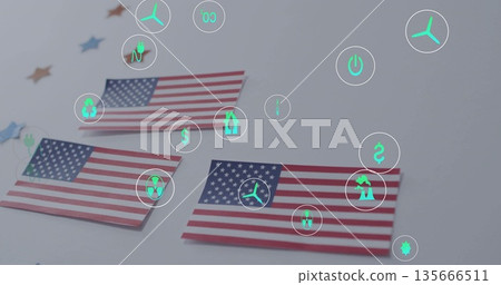 Three paper US flags displaying neon-green energy icons on light gray tabletop, with star confetti Three paper US flags displaying neon-green energy icons on light gray tabletop, with star confetti 135666511