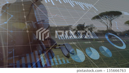 Walking Chinese man carrying golf bag on fairway, with digital charts and grid overlay, copy space Walking Chinese man carrying golf bag on fairway, with digital charts and grid overlay, copy space 135666763