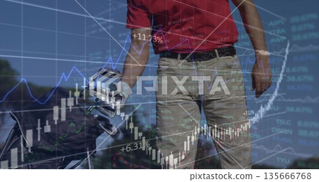 Standing golfer wearing red polo shirt holding golf bag on fairway, featuring finance chart overlay Standing golfer wearing red polo shirt holding golf bag on fairway, featuring finance chart overlay 135666768