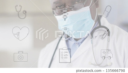 Standing doctor wearing lab coat, surgical mask, with overlaid icons in clinic hallway, copy space 135666798