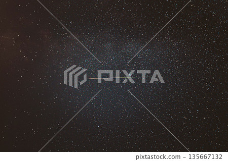 Real Night Sky Stars With Milky Way Galaxy. Natural Starry Sky Background with meteor trails lights. Background Night Starry Sky With Bright Stars And Meteoric Track Trail 135667132