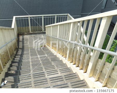 Down stairs of a pedestrian overpass Down stairs of a pedestrian overpass 135667175