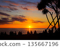 Okinawa People looking at the beautiful sunset Romantic coast 135667196