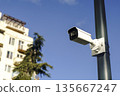 Surveillance Camera on Street Pole for Urban Security and Monitoring 135667247