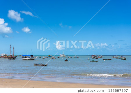 Fortaleza, Brazil- Nov 30, 2026: Traditional brazilian boats called Jangada in Fortaleza, Ceara, Brazil 135667597