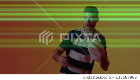 Athlete in jersey passing rugby ball on orange backdrop with green glitch lines, copy space Athlete in jersey passing rugby ball on orange backdrop with green glitch lines, copy space 135667969