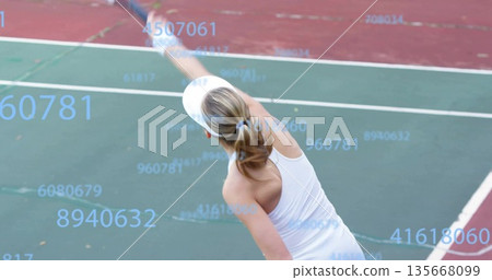 Tennis player in visor serving ball with racket on hard court lines, with numeric overlay Tennis player in visor serving ball with racket on hard court lines, with numeric overlay 135668099