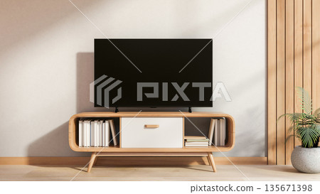 Television over drawer table on wooden floor and white wall in sunlit corridor of a modern house. 135671398