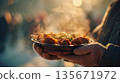 Hot street food in the open air, a hot home-cooked meal, hearty winter cuisine, the atmosphere of a city market 135671972