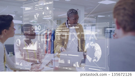Pointing presenter highlighting floating holographic charts in conference room, with digital globe Pointing presenter highlighting floating holographic charts in conference room, with digital globe 135672126