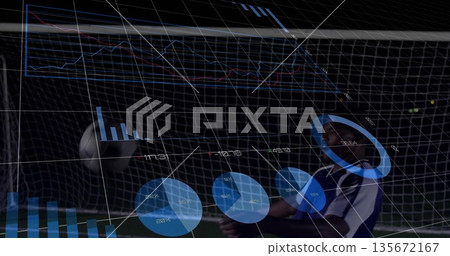 Diving gloved goalkeeper reaching for soccer ball at goal net, with analytics overlay copy space Diving gloved goalkeeper reaching for soccer ball at goal net, with analytics overlay copy space 135672167