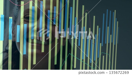 Smiling woman viewing transparent screen at office, with colorful bars, red green lines, copy space Smiling woman viewing transparent screen at office, with colorful bars, red green lines, copy space 135672269