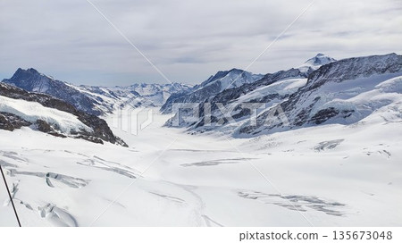 Interlaken,  Switzerland - March 18 2023: Surrounding View of Mountanious Interlaken 135673048