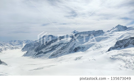 Interlaken,  Switzerland - March 18 2023: Surrounding View of Mountanious Interlaken 135673049