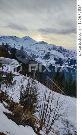 Interlaken, Switzerland - March 18 2023: Surrounding View of Mountanious Interlaken Interlaken, Switzerland - March 18 2023: Surrounding View of Mountanious Interlaken 135673084