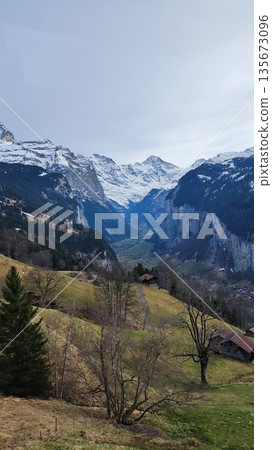 Interlaken,  Switzerland - March 18 2023: Surrounding View of Mountanious Interlaken 135673096