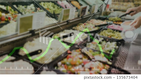 Grabbing hand selecting fresh salad ingredients at cafeteria bar with metal tongs and data overlay Grabbing hand selecting fresh salad ingredients at cafeteria bar with metal tongs and data overlay 135673404