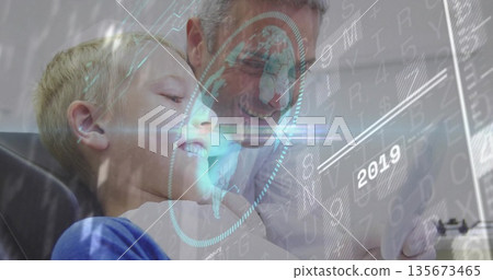 Smiling man and boy exploring holographic tablet display in living room, with world map data Smiling man and boy exploring holographic tablet display in living room, with world map data 135673465