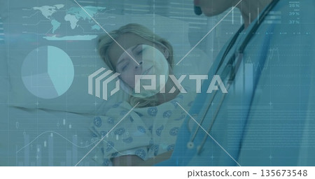 Doctor leaning over patient in hospital bed, with stethoscope, patterned gown and data graphics 135673548