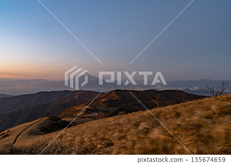 Mount Fuji at dusk viewed from the top of the mountain 135674659