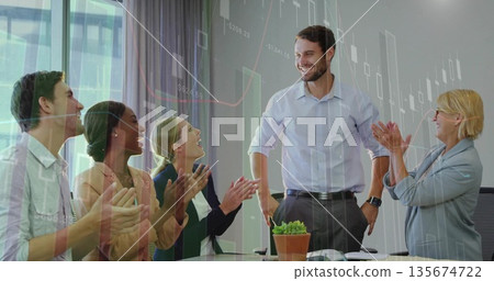 Smiling colleague accepting applause in conference room, with succulent and financial chart overlay Smiling colleague accepting applause in conference room, with succulent and financial chart overlay 135674722