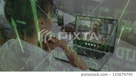 Sitting woman writing in notebook at home office, with laptop stock charts overlay, copy space Sitting woman writing in notebook at home office, with laptop stock charts overlay, copy space 135674795