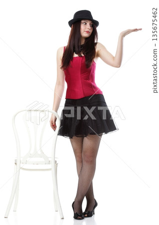 showgirl woman dance in red corset chair white isolated 135675462