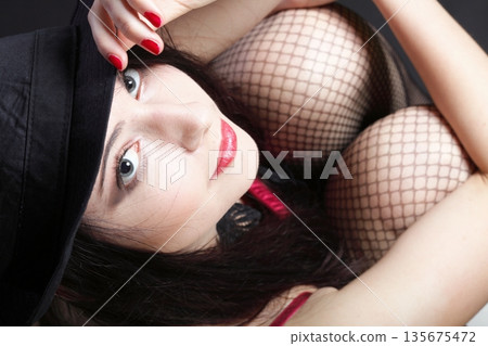 Portrait woman in red corset Portrait woman in red corset 135675472