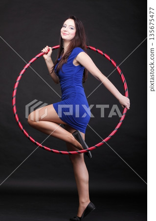Dance hoop Beautiful woman in blue Dance hoop Beautiful woman in blue 135675477