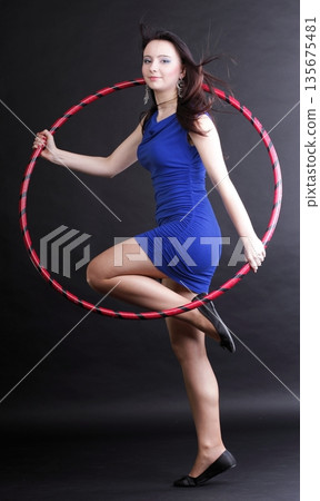 Dance hoop Beautiful woman in blue Dance hoop Beautiful woman in blue 135675481