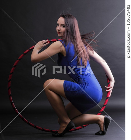 Dance hoop Beautiful woman in blue Dance hoop Beautiful woman in blue 135675482