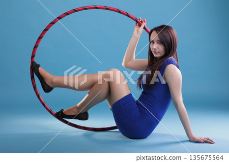 Dance hoop Beautiful woman in blue 135675564