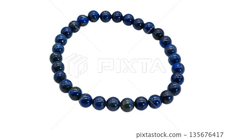 Lapis lazuli bracelet on white background, macro photography Lapis lazuli bracelet on white background, macro photography 135676417