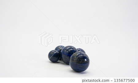 Lapis lazuli ball macro photography white background Lapis lazuli ball macro photography white background 135677500