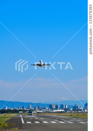 Osaka airport takeoff 135678365