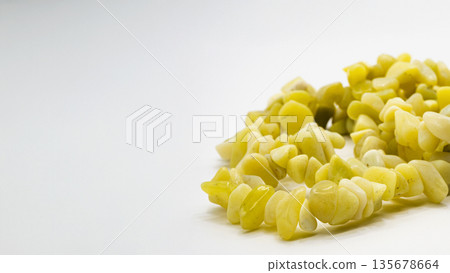 Olive jade chip stone macro photography white background 135678664