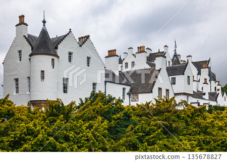 Blair Castle white baronial architecture above lush gardens Scotland 135678827