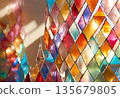 Colored glass panel reflecting light into vivid rainbow hues AI Generated 135679805