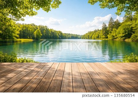 Wooden Pier by Calm Lake Surrounded by Green Forest 135680554
