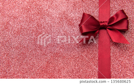Red glitter background with ribbon bow wrapping concept 135680625