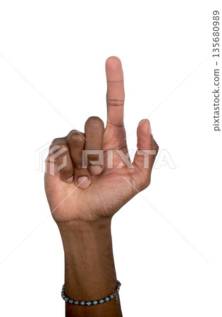 Finger pointing up gesture, African American person raising index finger vertically. Symbol of 135680989