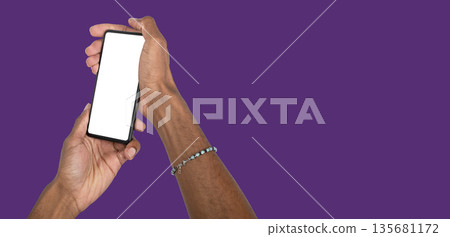 Hand holding smartphone with blank screen mockup, symbolizing communication, digital connection, and Hand holding smartphone with blank screen mockup, symbolizing communication, digital connection, and 135681172