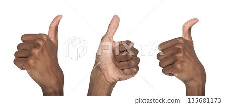Hand showing thumbs up gesture, African American man expressing approval, success and positivity. Hand showing thumbs up gesture, African American man expressing approval, success and positivity. 135681173