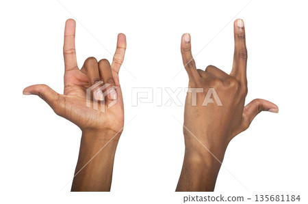 Rock hand gesture, African American man raising fingers in the classic metal horn sign. Symbol of Rock hand gesture, African American man raising fingers in the classic metal horn sign. Symbol of 135681184