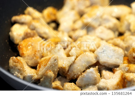 chicken pieces fried in frying pan chicken pieces fried in frying pan 135681264