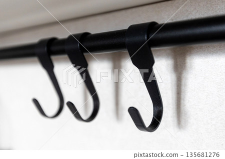 Black metal wall hanger rail and hooks 135681276